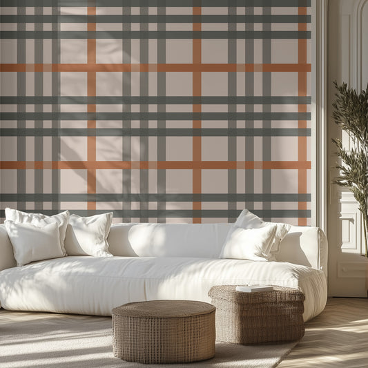 Modern living room with a classic plaid wall design, white sofa, and wicker ottomans.