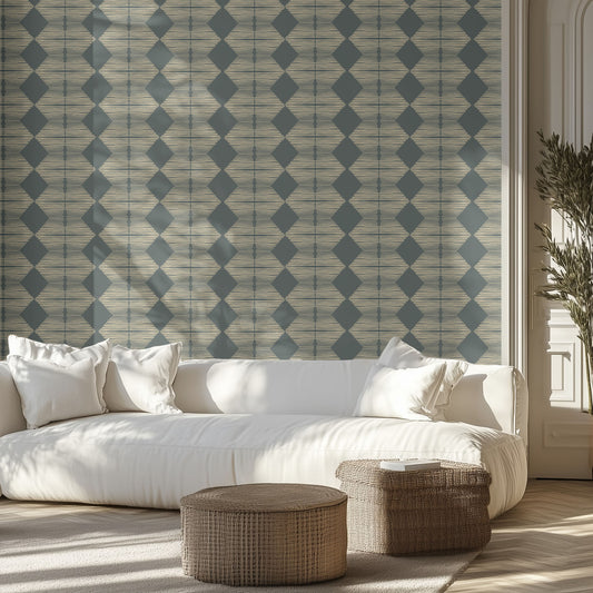 Living room with a white sofa and a textured geometric diamond patterned wallpaper on the walls.