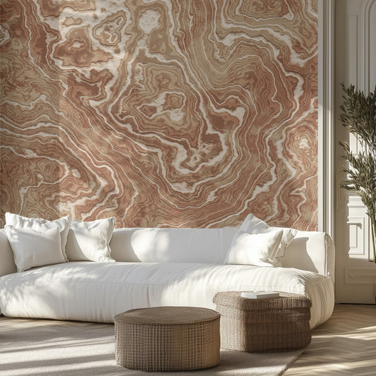 Living room with brown marble-patterned wallpaper, white sofa, and wicker ottomans.