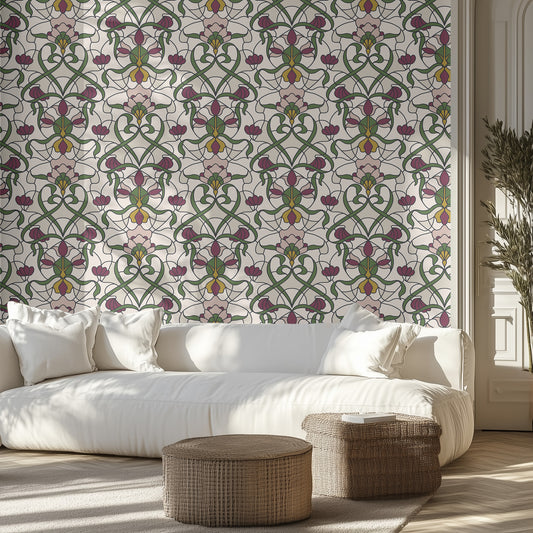 Living room with a cream and floral stained glass patterned wall, white sofa, and decorative ottomans.
