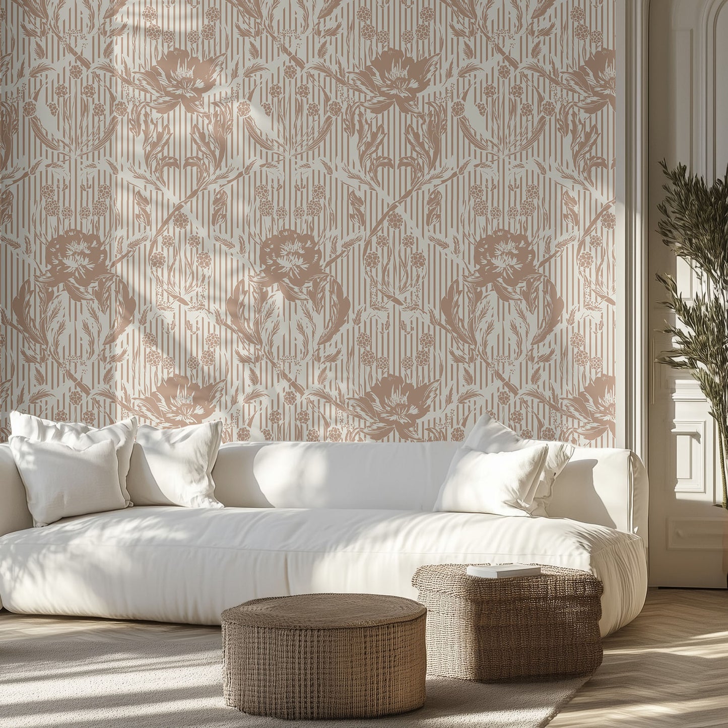 Living room with vintage brown floral wallpaper, white sofa, and wicker ottomans.