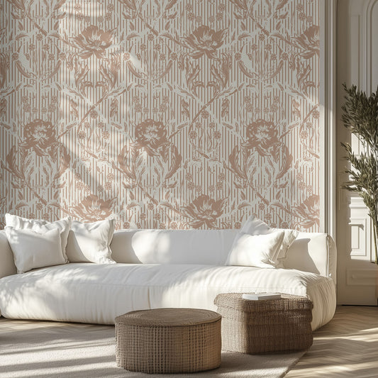 Living room with vintage brown floral wallpaper, white sofa, and wicker ottomans.