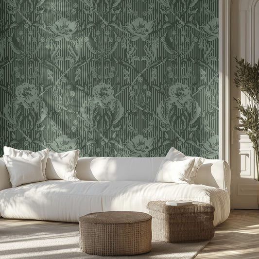Living room with white sofa, patterned green floral wallpaper, and wicker ottomans.