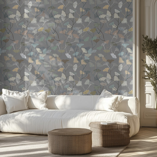 Living room with a white sofa, wicker ottomans, and gray, leafy decorative wall paper.