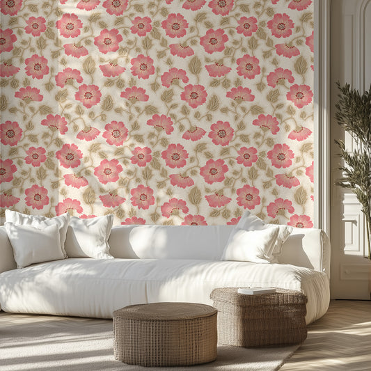 Living room with beige and pink floral wallpaper, white sofa, and wicker ottomans.