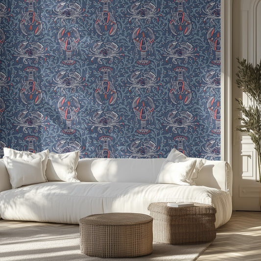 Living room with white sofa, navy blue marine life patterned wall, and wicker ottomans.