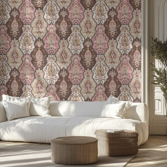 Living room with a white sofa, ornate pink and beige patterned wall, and decorative ottomans.