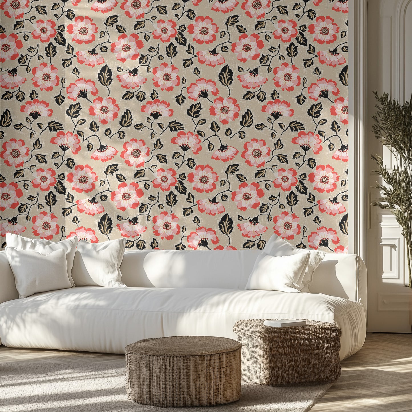 Living room with pink and beige floral wallpaper, white sofa, and wicker ottomans.