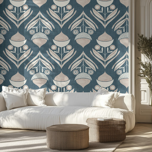 Living room with a teal blue and cream textured patterned wall, white sofa, and decorative ottomans.