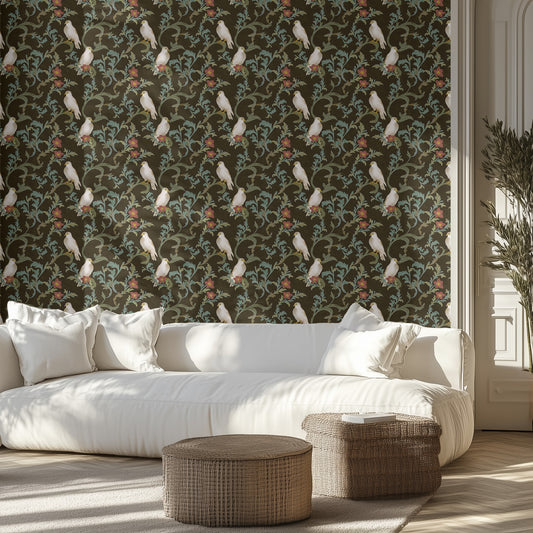 Living room with dark bird and floral wallpaper, white sofa, and wicker ottomans.
