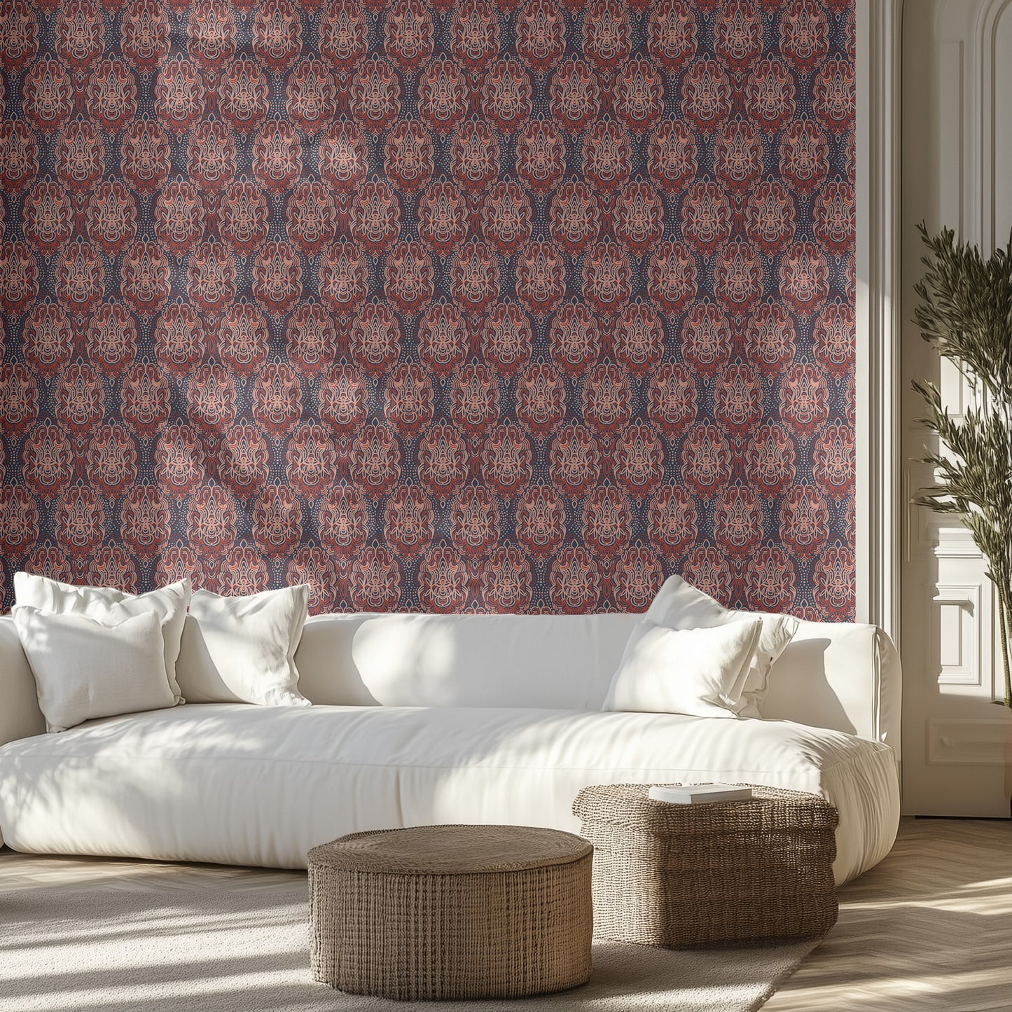 Modern living room with a white sofa, maroon boho patterned wallpaper, and decorative items.