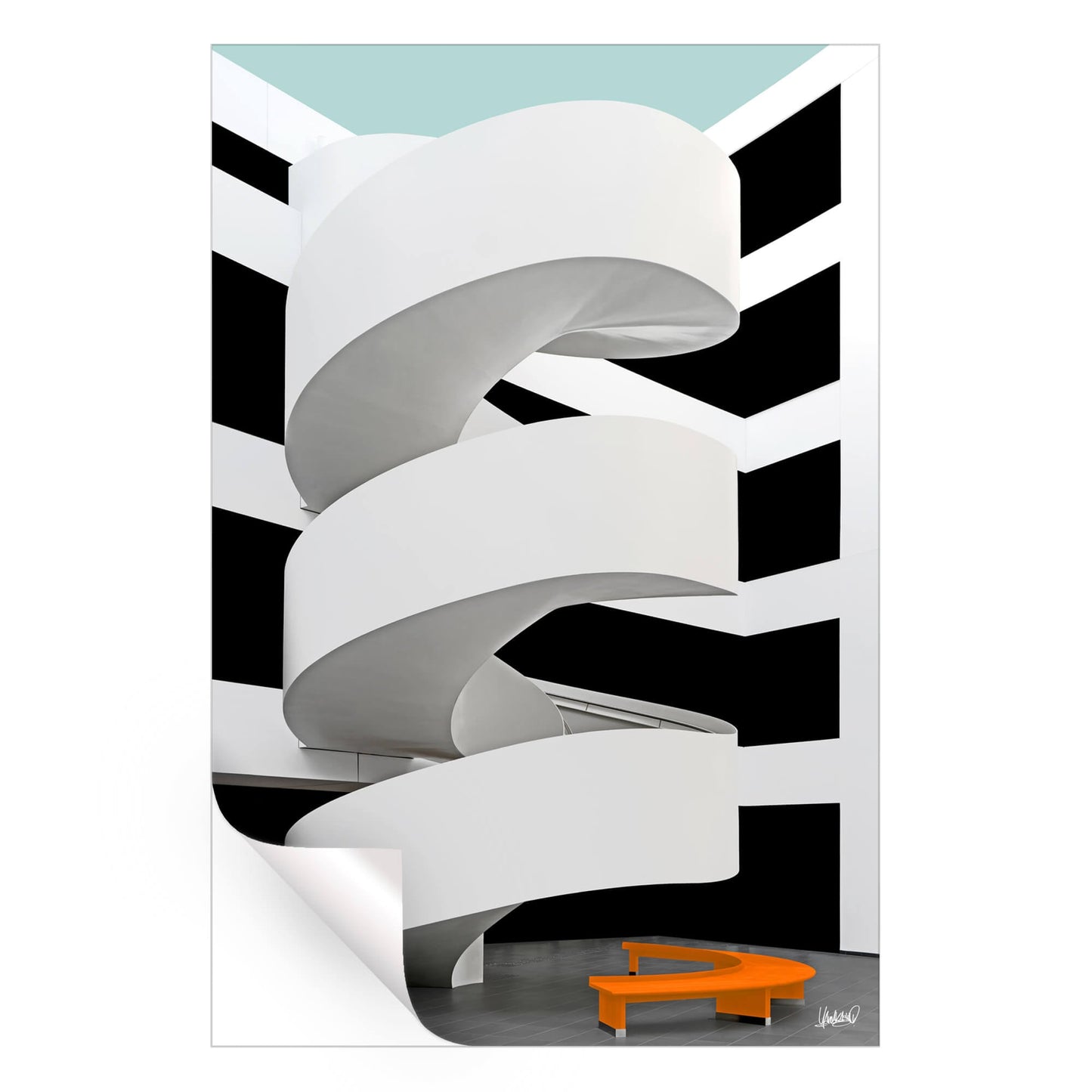 White ramp with black and white background and an orange bench.