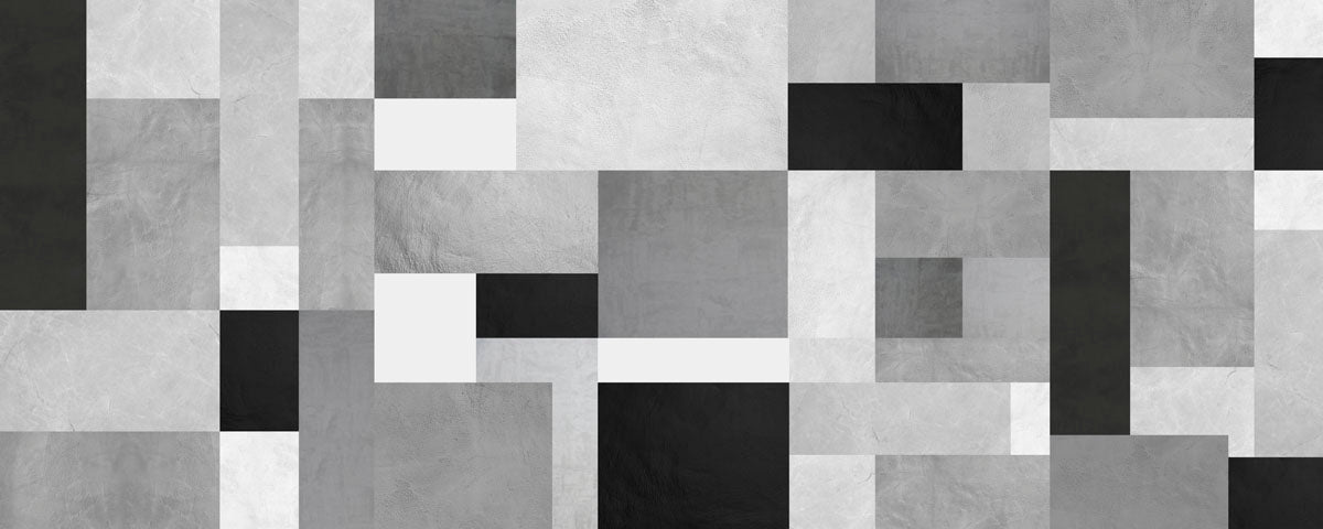 Pattern of black, white, and gray squares on a textured background.