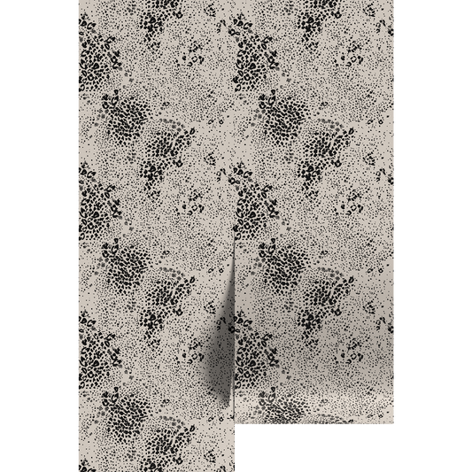 Cream and black chetah pattern on wallpaper panels.