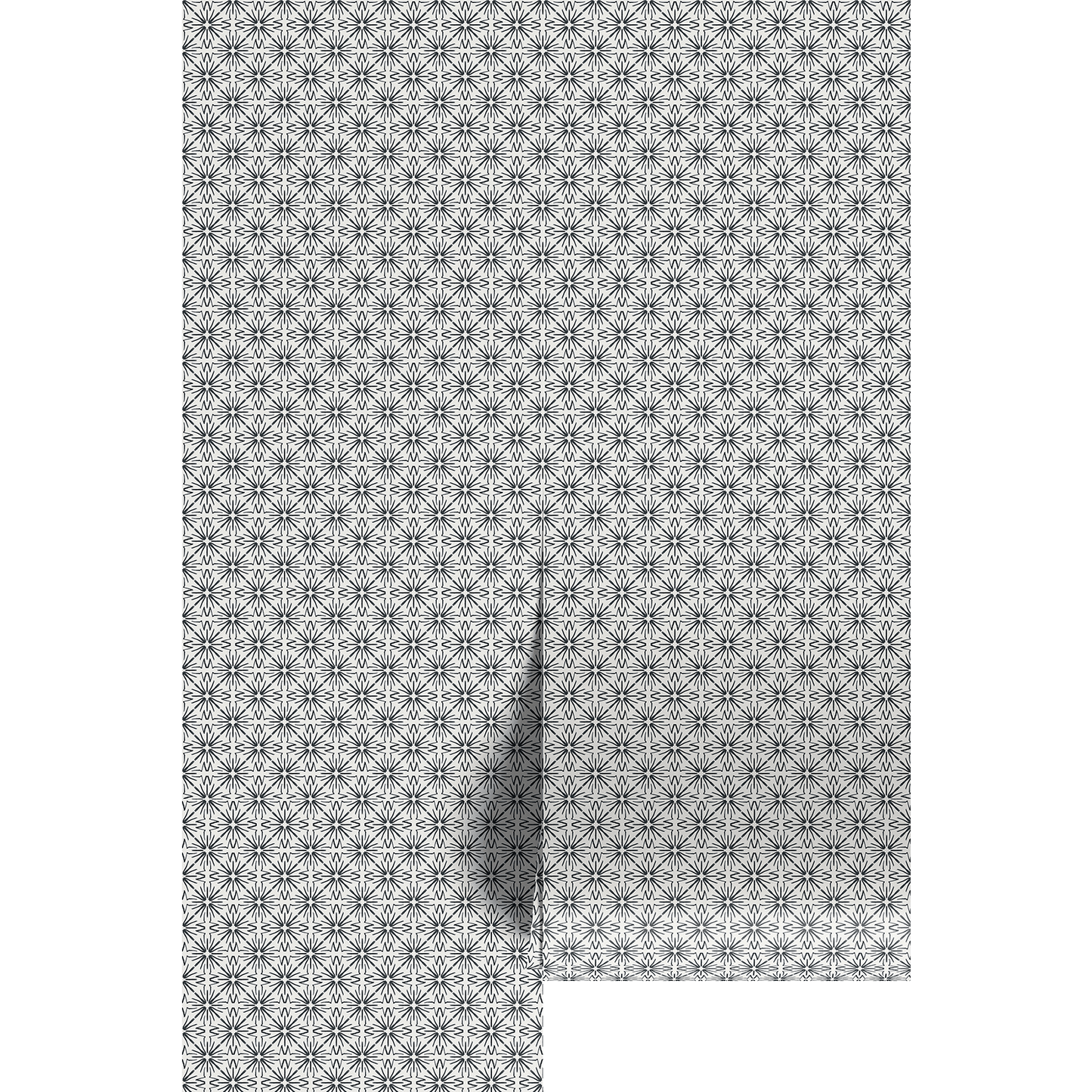 Black and white star burst geometric wallpaper design on wallpaper panels.