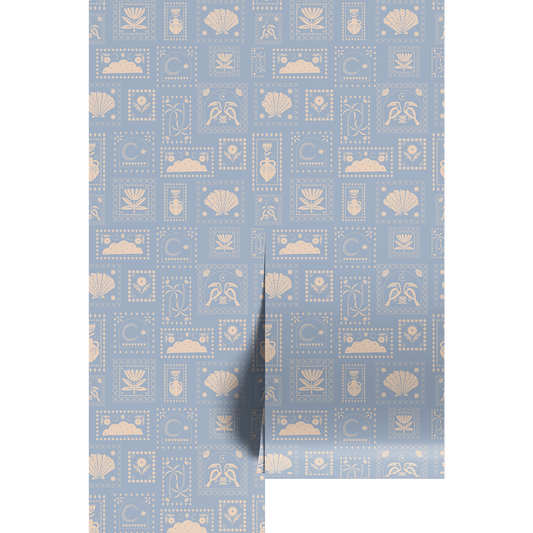 Blue and white vintage postage stamp pattern on wallpaper panels.