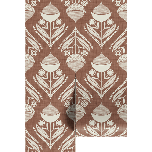Brown and white textured pattern of acorns and leaves shown on wallpaper panels.