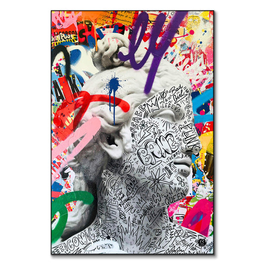 Classical sculpture with modern doodles and colorful graffiti.