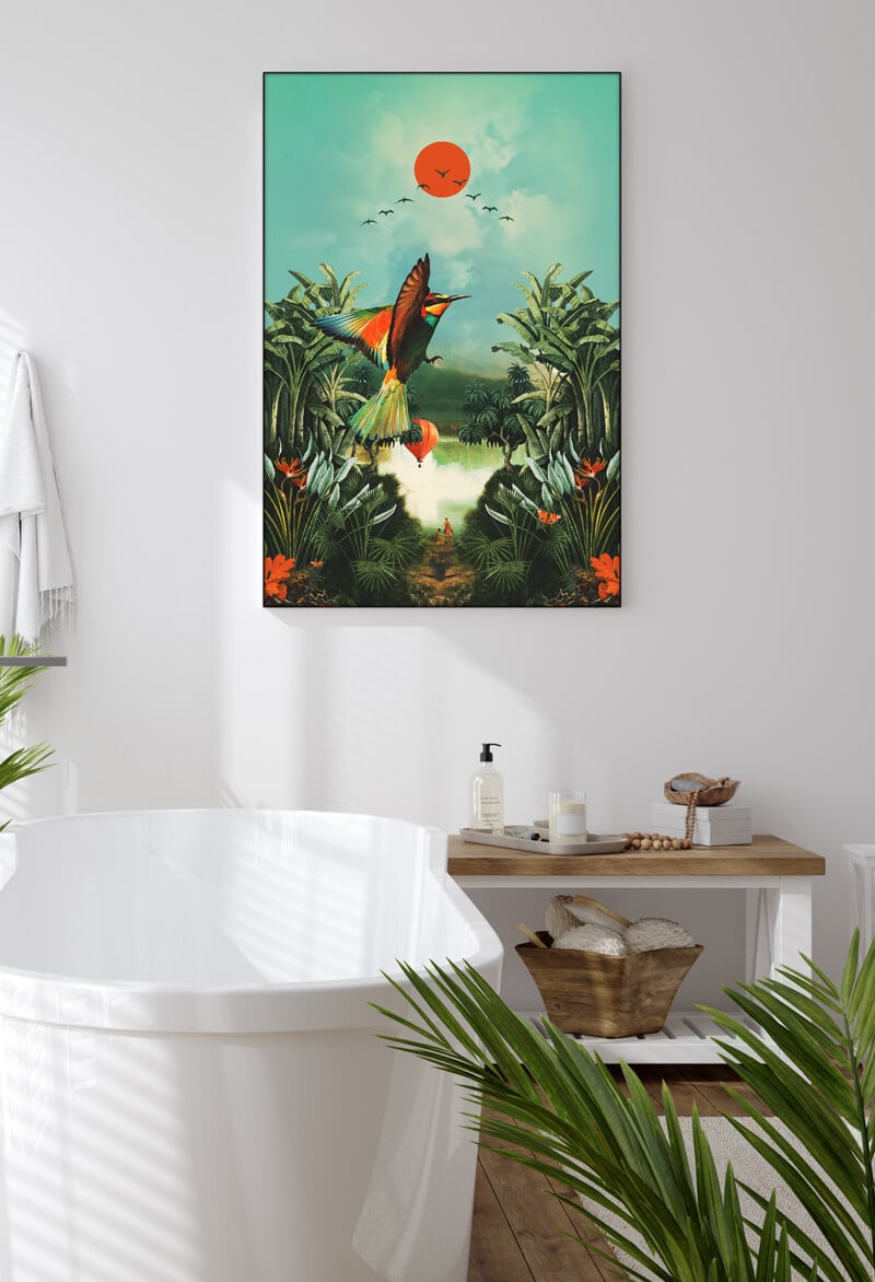 Bathroom wall art with a tropical bird flying hanging above white soaking tub.