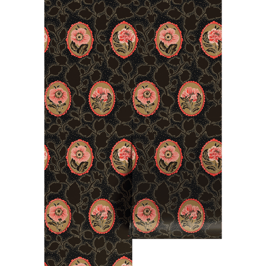 Decorative paper with dark floral cameo pattern on a black background
