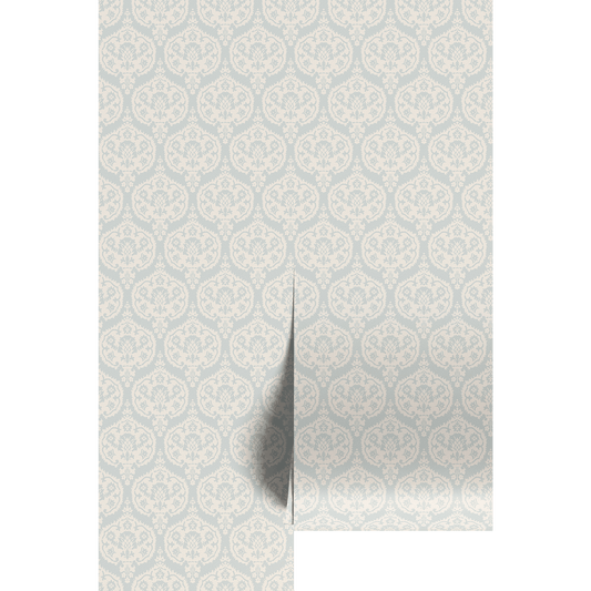 Soft aqua and cream damask pattern on wallpaper panels.