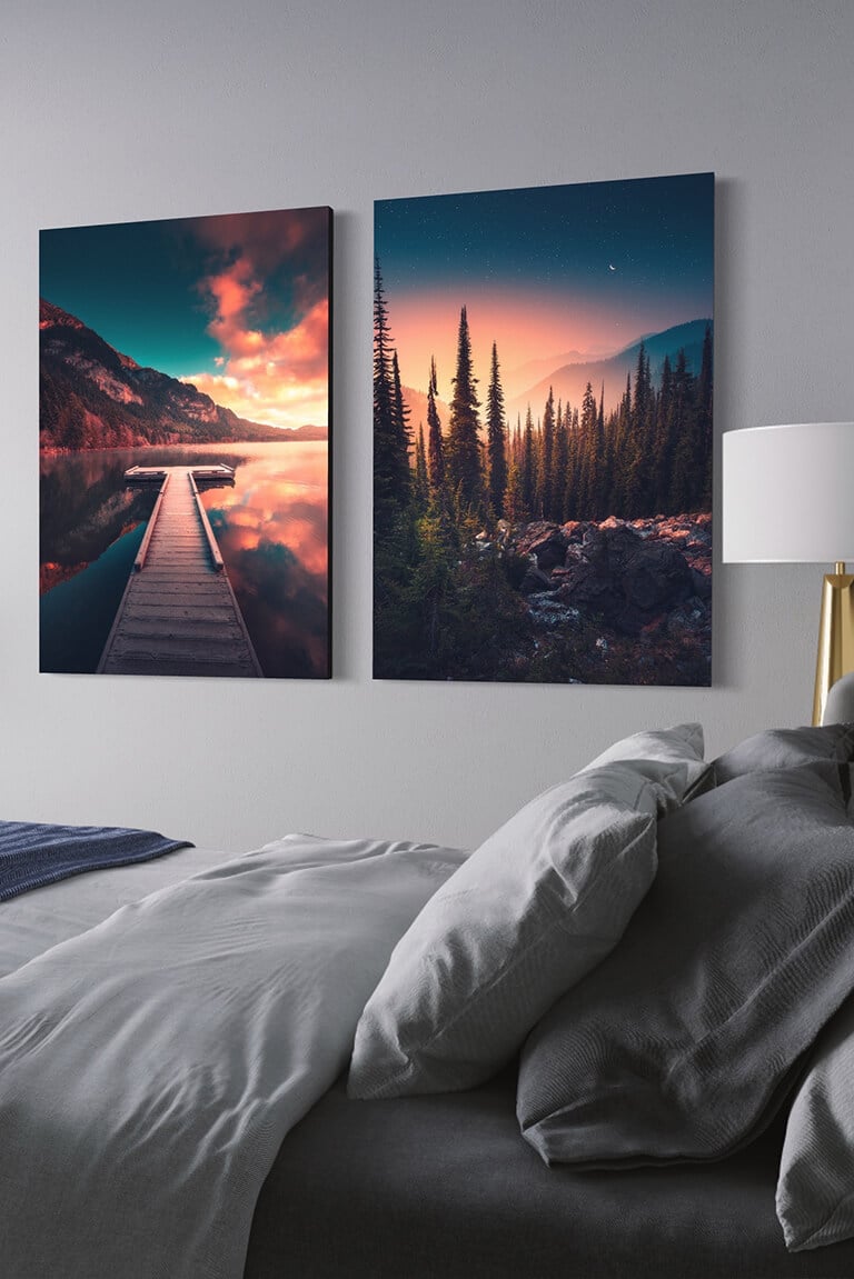 Set of fall nature wall art featuring mountains, trees, and sunsets hung in gray living room