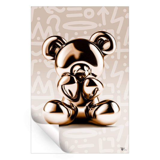 Gold metallic bear sculpture on a graffiti-inspired cream background with abstract patterns.