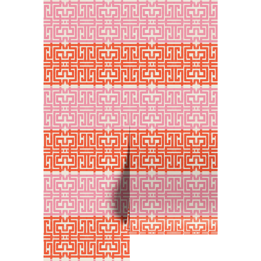 Patterned paper with geometric design in red and pink on wallpaper panels.