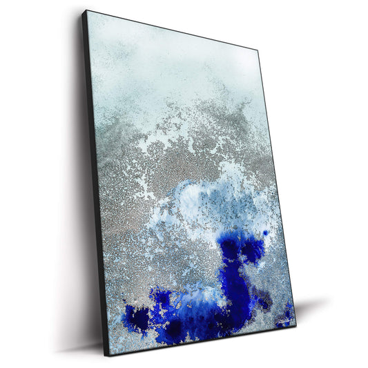 Abstract artwork of flowing dark and light blue tones with gold accents resembling ocean waves.