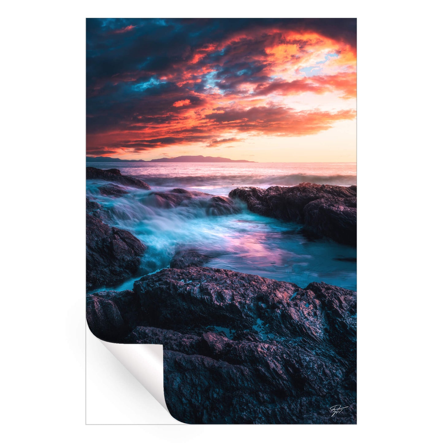 Sunset over the rugged coast of Tofino, British Columbia, with vibrant sky colors and crashing waves.