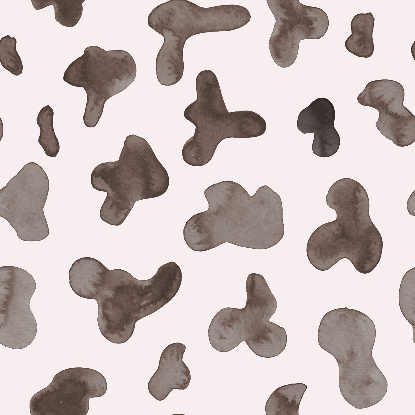 Pattern of brown abstract cowhide shapes on a white background