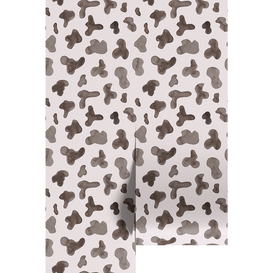 Patterned wallpeper with brown abstract shapes on a white background
