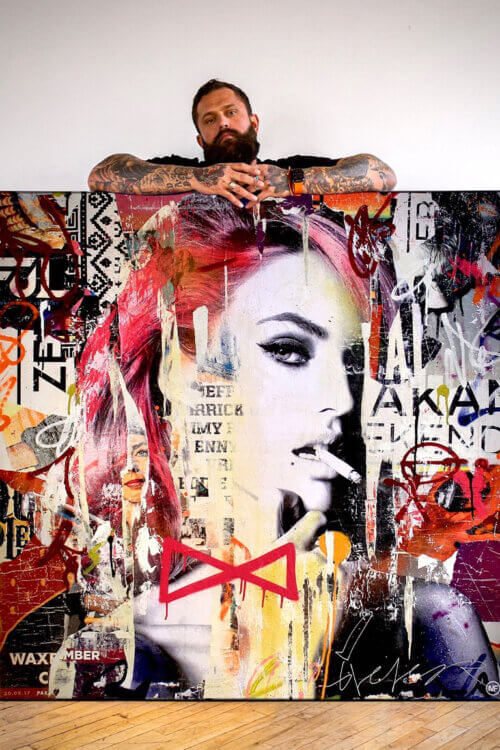 Large graffiti pop art featuring Victoria Secret model Candice Swanepoel surrounded by red and pink