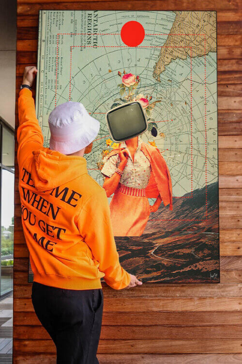 Massive surreal art of lady with TV head on map of Antarctica hangs on wooden wall