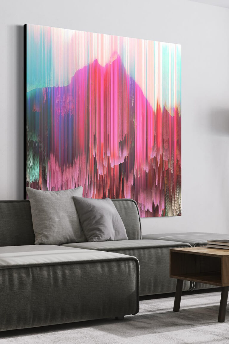 Huge magenta and teal blue abstract digital painting of the sky hangs above the couch in modern grey minimal living room.