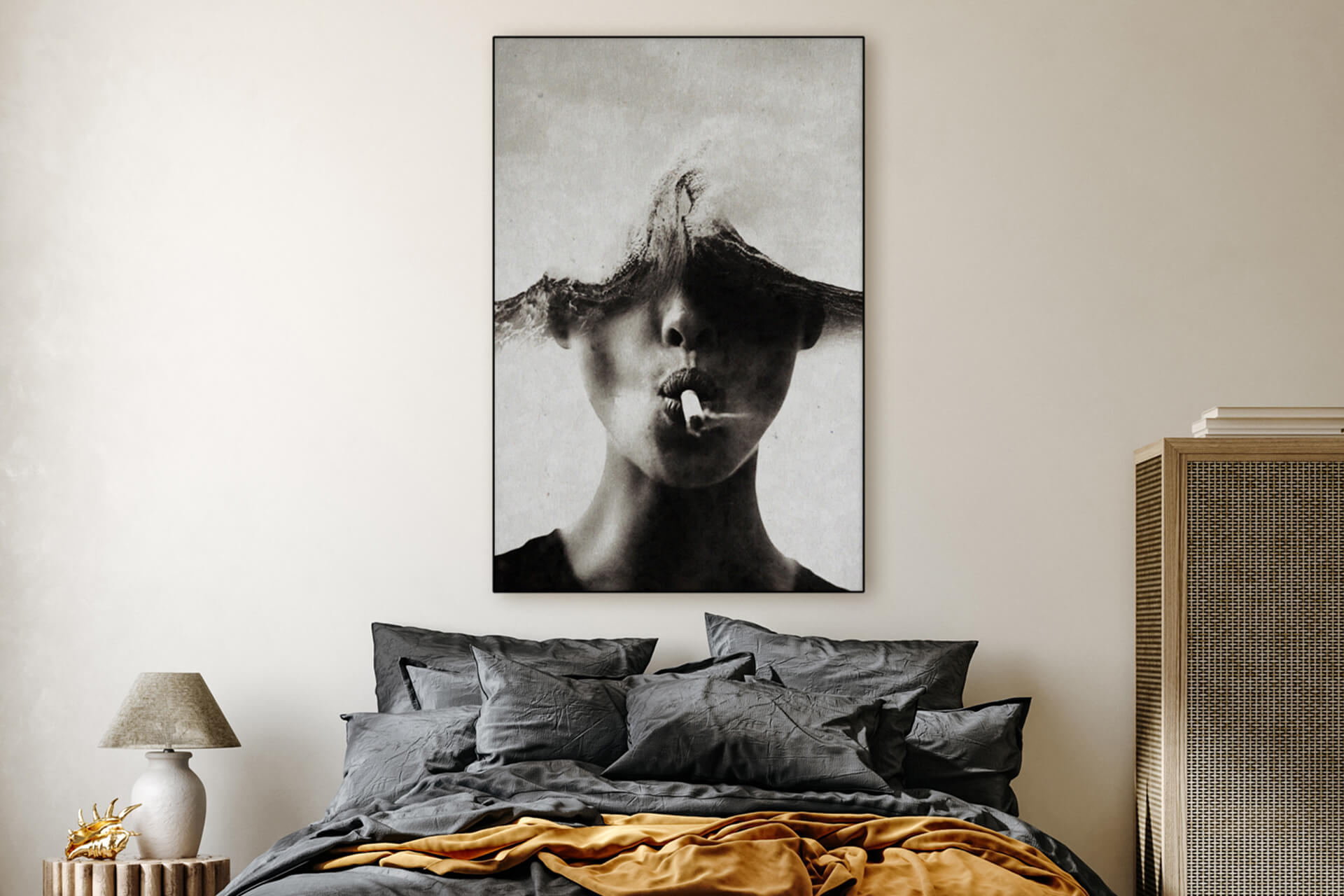 Huge minimal black and white photo of person smoking with waves for the top half of their head hangs on neutral wall in bedroom