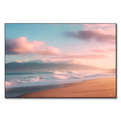 Serene beach at sunrise with gentle waves, pink clouds, and mist-covered mountains.