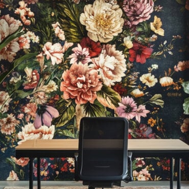 Modern flower art print hanging above a neutral-toned couch