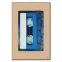 Retro blue audio cassette tape with a white and blue label against a tan background.