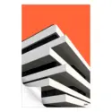 White layered modern building with a vibrant orange background and a minimalist design.