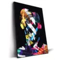 Abstract portrait with a colorful silhouette against a dark background, with bold brushstrokes and dynamic patterns.