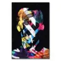 Abstract portrait with a colorful silhouette against a dark background, with bold brushstrokes.