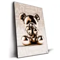 Gold metallic bear sculpture on a graffiti-inspired cream background with abstract patterns.
