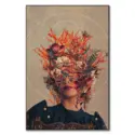 A surreal floral portrait with a woman’s face covered by vivid flowers and geometric shapes.