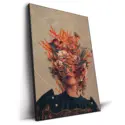 A surreal floral portrait with a woman’s face covered by vivid flowers and geometric shapes.