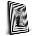 A man standing in an optical illusion hallway with black and white concentric stripes, creating a sense of infinite space.