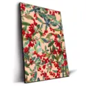 Botanical artwork featuring vibrant red holly berries and lush green leaves intertwined against a soft peach background.