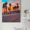 Extra large wall art of Santa Monica pier at sunset hung in neutral grey and white office