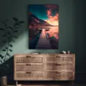 Extra large vertical nature photo of dock extending out into lake with sunset reflecting in water hangs in modern boho bedroom