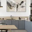 Extra large abstract wall art for kitchen in neutral colors hangs on wall above kitchen sink.